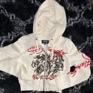 Ed Hardy Cream Hoodie with Red Accents

New never worn, woman’s s